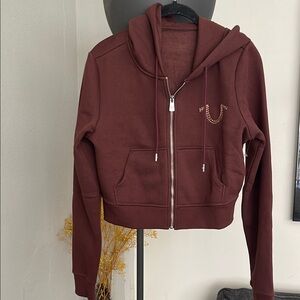 Women’s True Religion Brown Zip-Up Hoodie with Embroidery Detail size small.